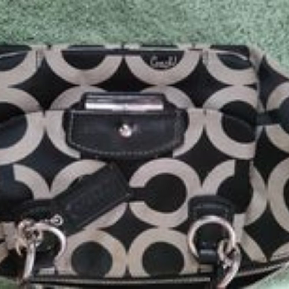 Coach black and cream tote purse.